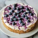 No-Bake Blueberry Cheesecake: A Beautifully Simple Summer Dessert 5 No-Bake Blueberry Cheesecake topped with blueberry sauce