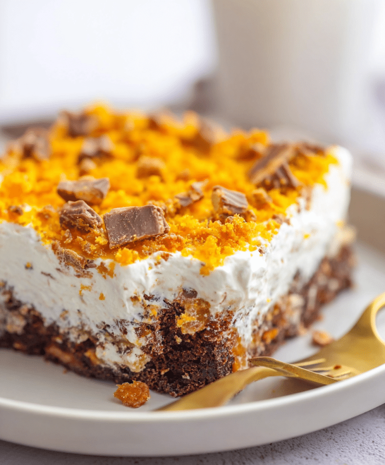 u6852584378 httpss.mj .run DJ7Im7qYRs Butterfinger Poke Cake d22d87e0 3eb4 4045 b68d 7bc5e7d7f8d4 1